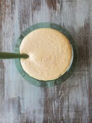 Foamy, active yeast in a small bowl