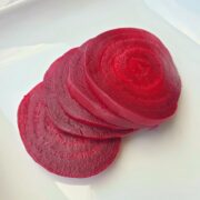 Sliced beets on a white plate